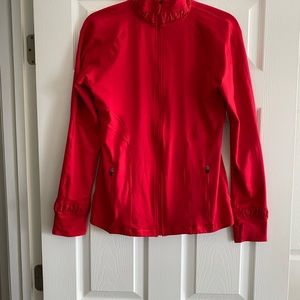 Spans red athletic jacket